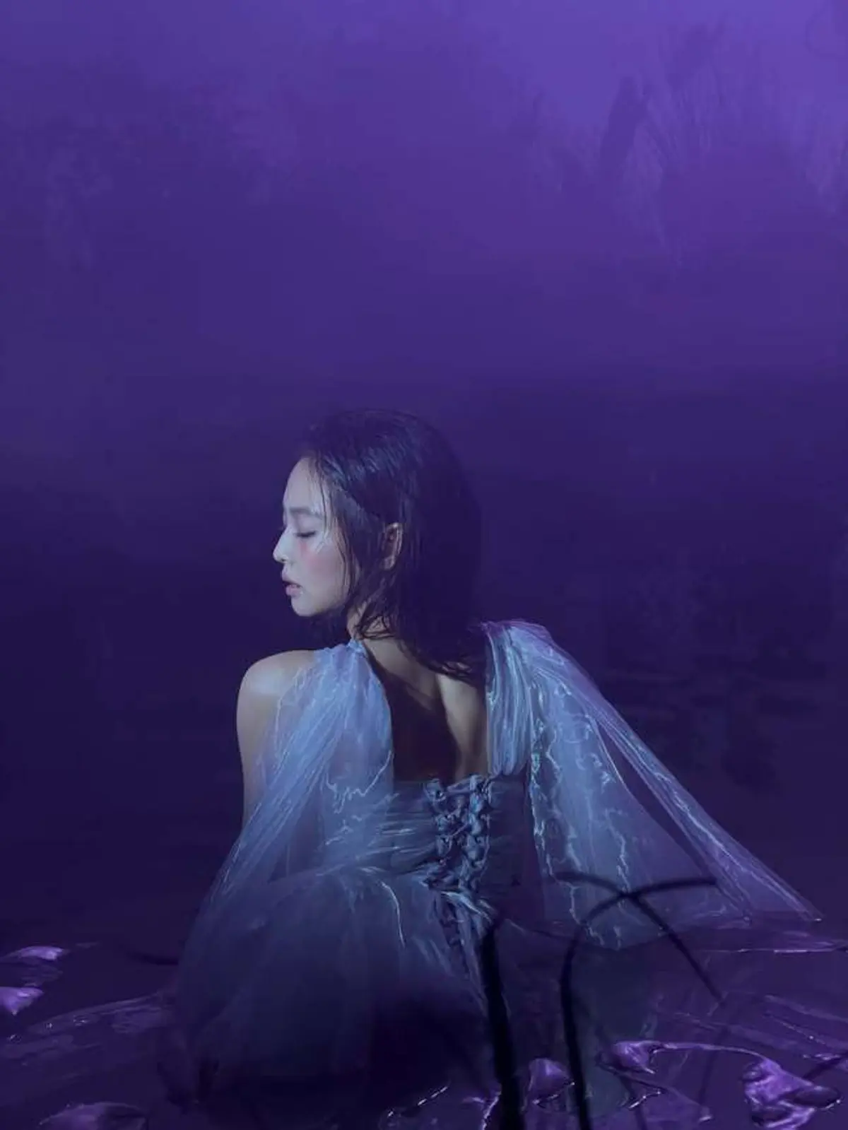 Jennie drops 'FALLEN ANGEL' MV: wires, water tanks, and minimalist acoustic pop
